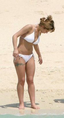 Cheryl Cole Tribal Tattoo On Thigh